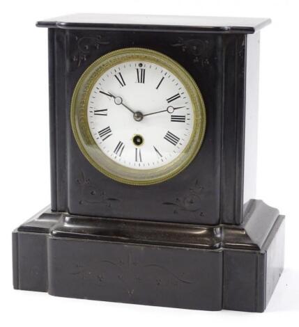 A Victorian black slate mantel clock