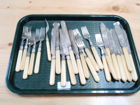 A set of late Victorian silver bladed fish knives and forks with ivorine handles