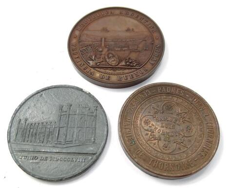 Three commemorative medallions