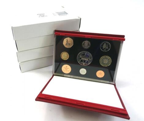 Five United Kingdom annual coin sets