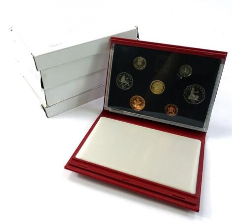 Five United Kingdom annual coin sets