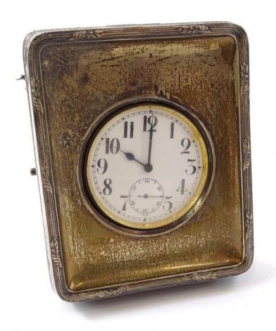 An Edwardian silver mounted watch case