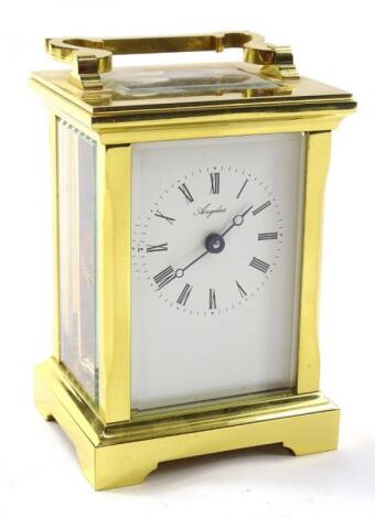 An Angelus brass carriage clock