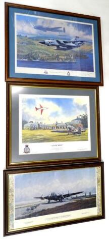 A collection of signed aviation prints