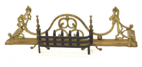 An Art Nouveau style brass fender