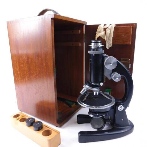 An ebonised metal microscope