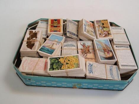 A quantity of mid 20th century cigarette cards