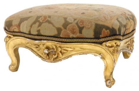 A gilt wood footstool