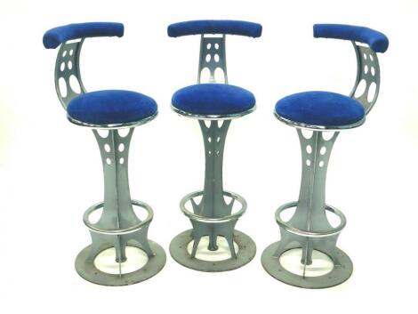 A set of three retro style bar stools