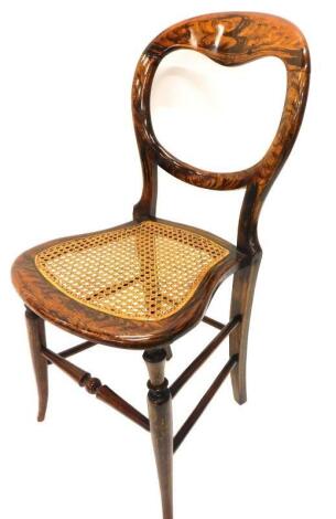 A Victorian balloon back chair