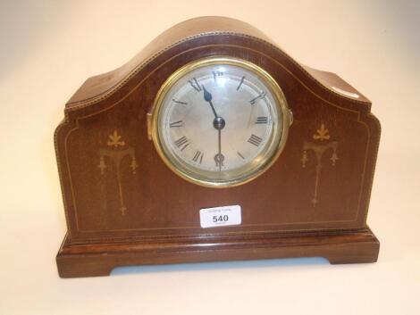 An Edwardian string-inlaid mahogany mantel clock