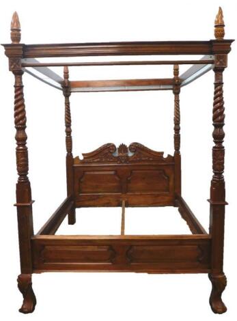 An Eastern hardwood colonial style four post bed