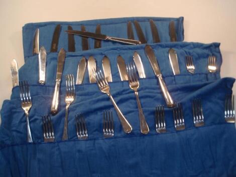 A Garrard & Co silver plated ten place setting part cutlery set with rolls