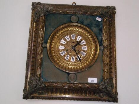 A 19th century French wall clock with pressed gilt dial with enamel numeral tablets