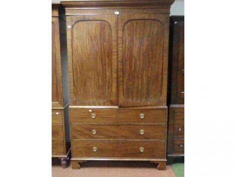 A Regency mahogany linen press with moulded cornice