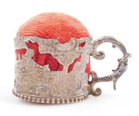 A Victorian tankard pin cushion