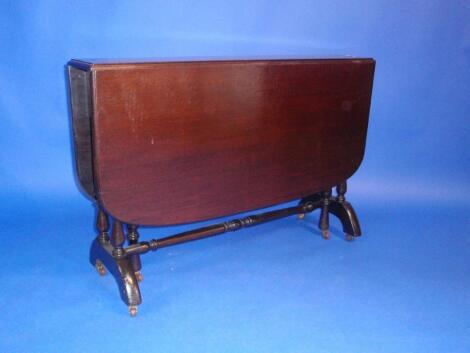 A late Victorian mahogany Sutherland table