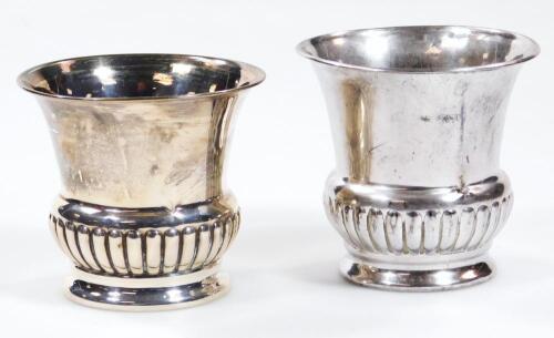 A matched pair of silver campana shaped vases
