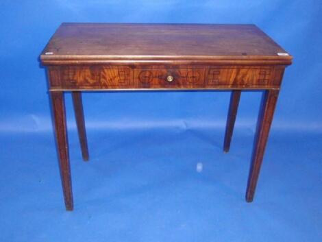 A George III mahogany tea table with rectangular folding top