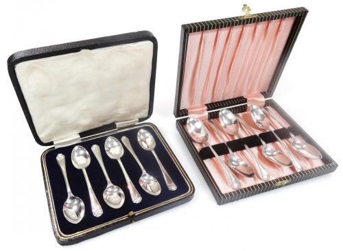 A set of six George V cased silver spoons