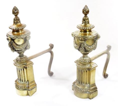 A pair of 18thC style brass classical design fire dogs