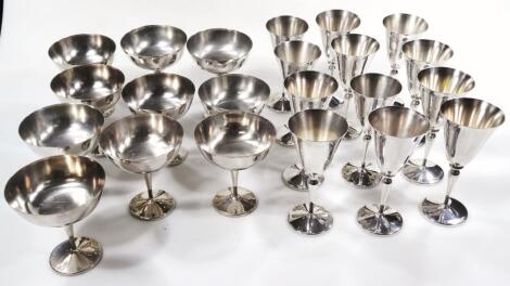 Various polished metal drinking glasses