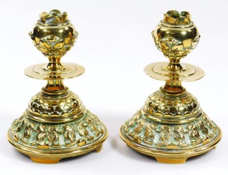 A pair of late 19thC brass candle sticks