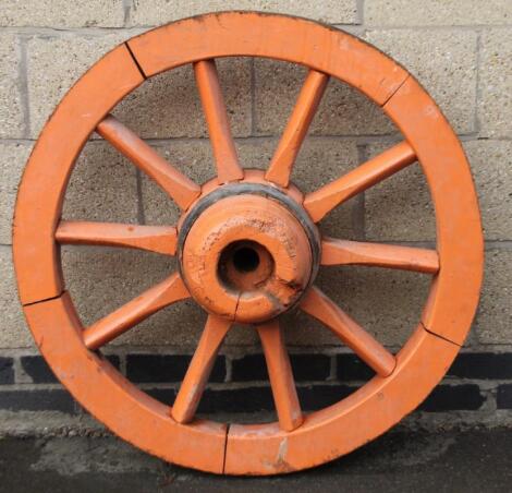 An early 20thC wooden cartwheel