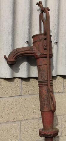 An early 19thC cast metal water pump