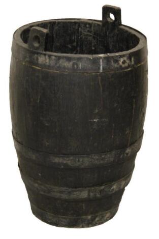 An early 20thC plank and coopered metal barrel shaped planter