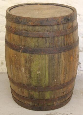 An early 20thC coopered barrel of large proportion