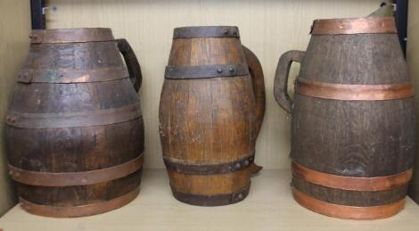 An early 20thC oak coopered flagon