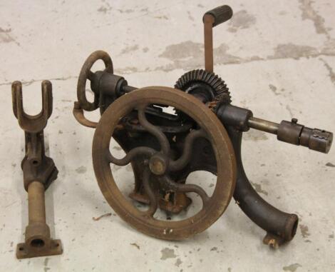 An early 20thC industrial table top metal drill