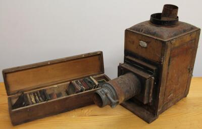 A late 19thC mahogany cased magic lantern projector