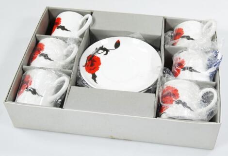 A Wedgwood boxed Susie Cooper design Corn Poppy pattern part coffee service