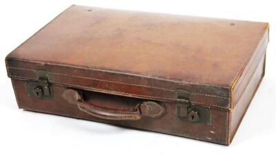 A mid 20thC brown leather travel case