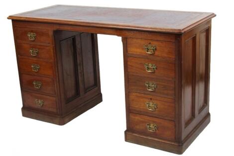 A 19thC oak twin pedestal writing desk