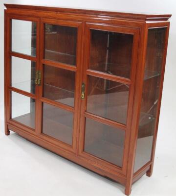 A Chinese stained hardwood display cabinet