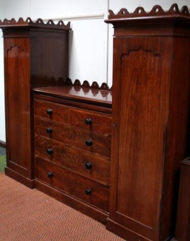 A Victorian mahogany sentry compactum wardrobe