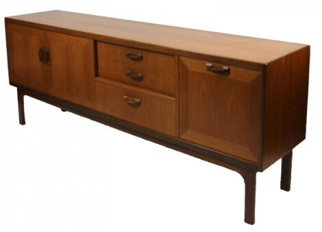 A retro teak G-Plan style light wood sideboard