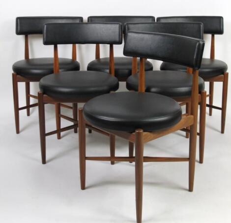 A set of six 1970s G-Plan retro teak and leather finish dining chairs