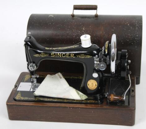 An early 20thC cased sewing machine