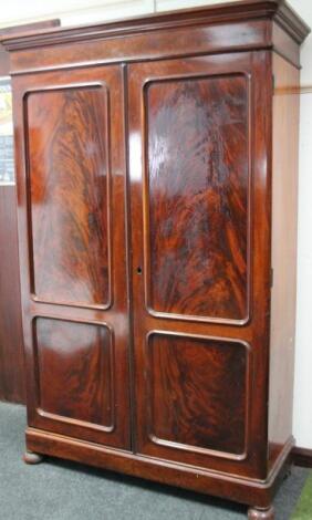 A Victorian flame mahogany double wardrobe