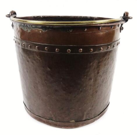 A late 19thC studded metal coal bucket