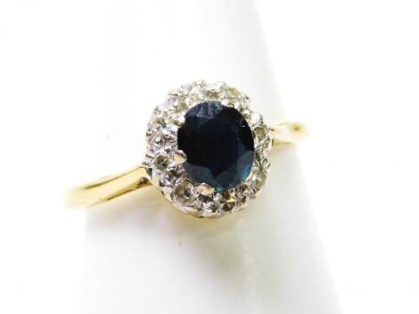 An 18ct gold sapphire and diamond ring