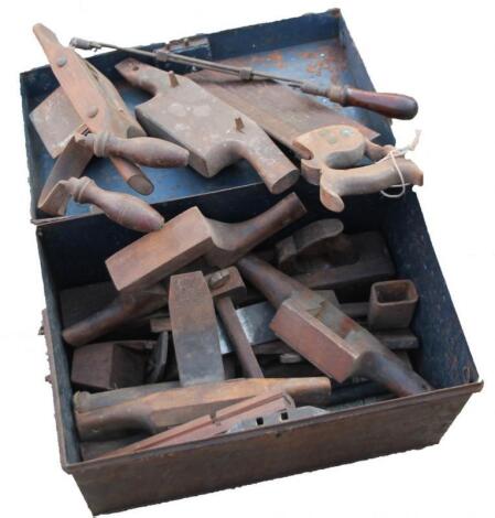 A tin trunk containing cooper's tools. (a quantity)