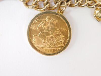 A George V gold full sovereign 1912 on a 9ct gold curb link charm bracelet - 2