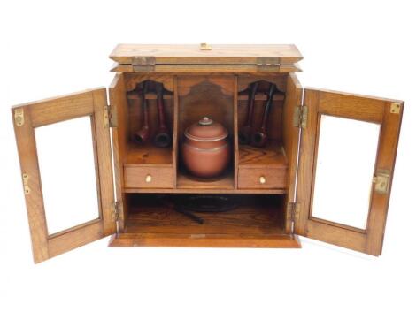 A Victorian oak smoker's cabinet