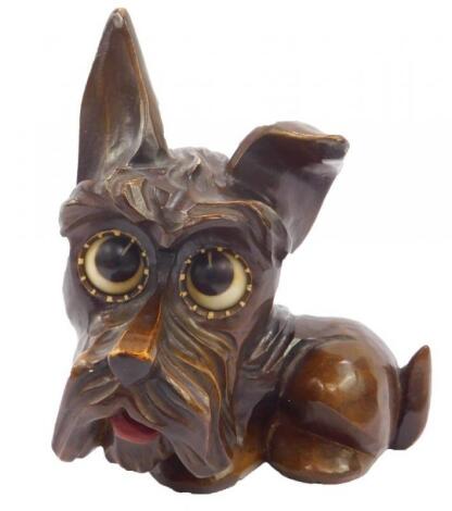 An Oswold Black Forest wood Scottie dog clock