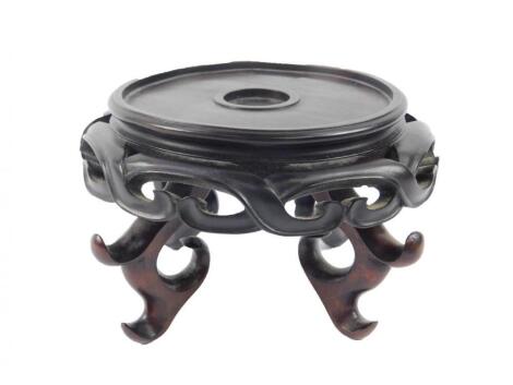 A Chinese hardwood urn stand